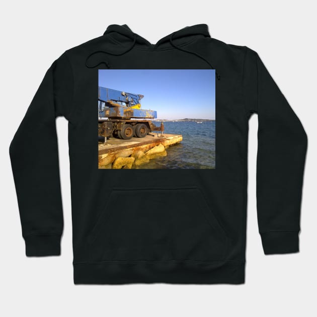 Old crane at the beach of Grimaud, opposite of St. Tropez, le Provence Hoodie by robelf